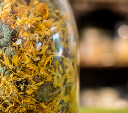 A jar of calendula flowers