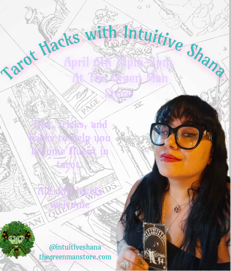 a woman with glasses and a black dress holding a deck of cards