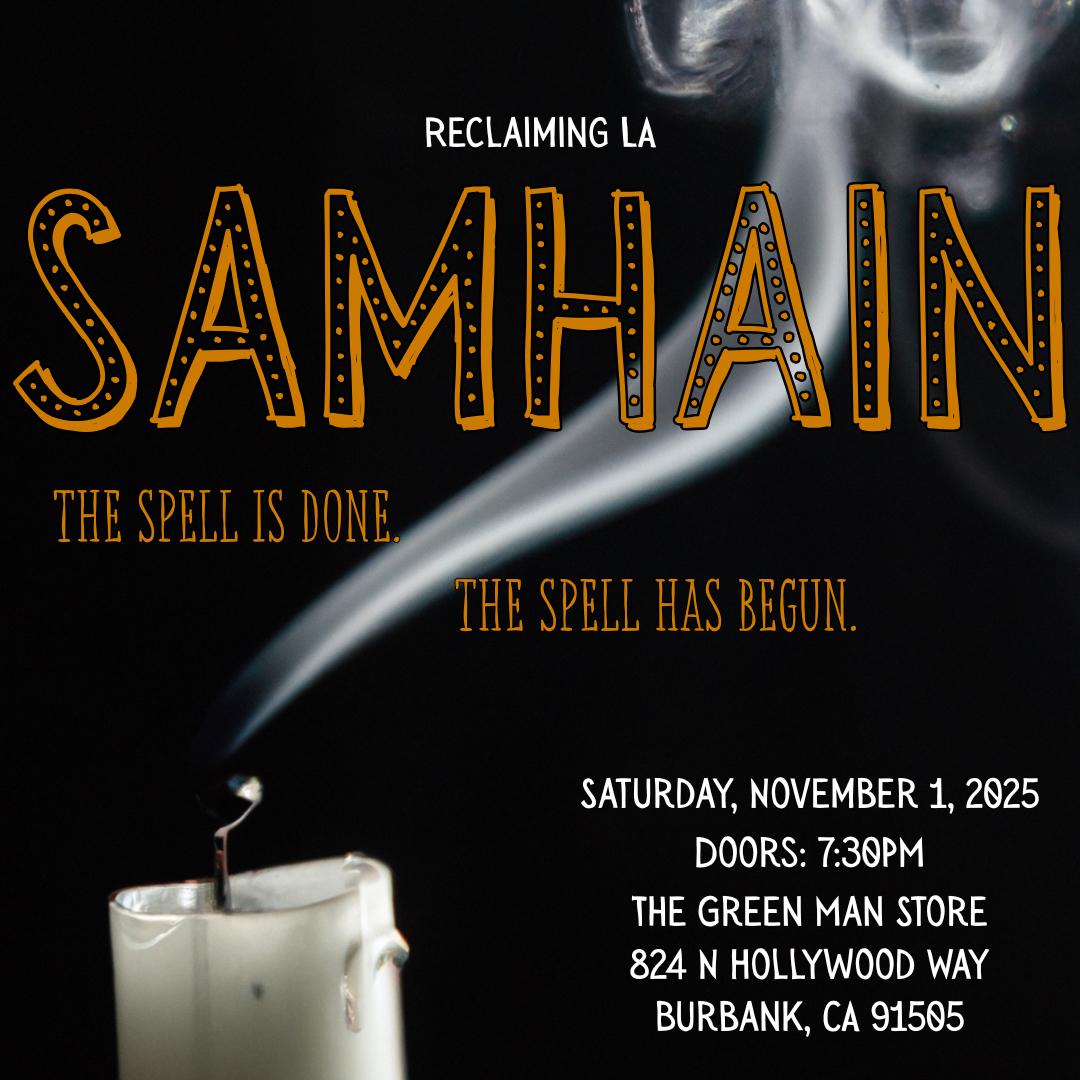 A white candle with smoke coming out of it