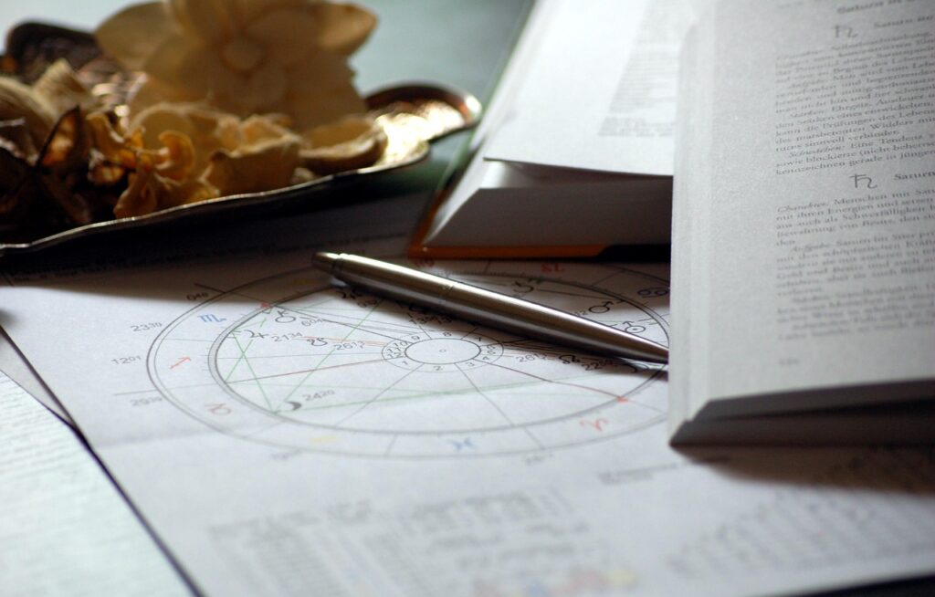 A pen and a book on a table