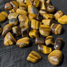 a pile of brown and black stones